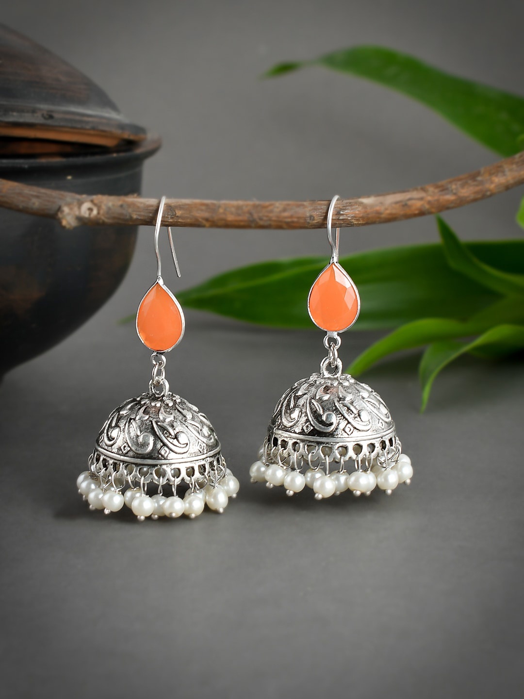 

Silvermerc Designs Women Silver-Toned & Orange Studded Dome Shaped Jhumkas Earrings