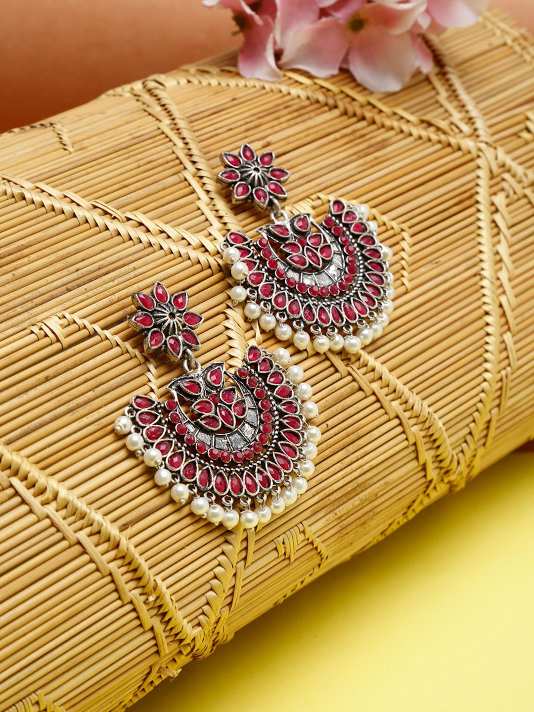 

NEUDIS Silver-Toned Red Stones & White Pearl Studed Floral Drop Earrings