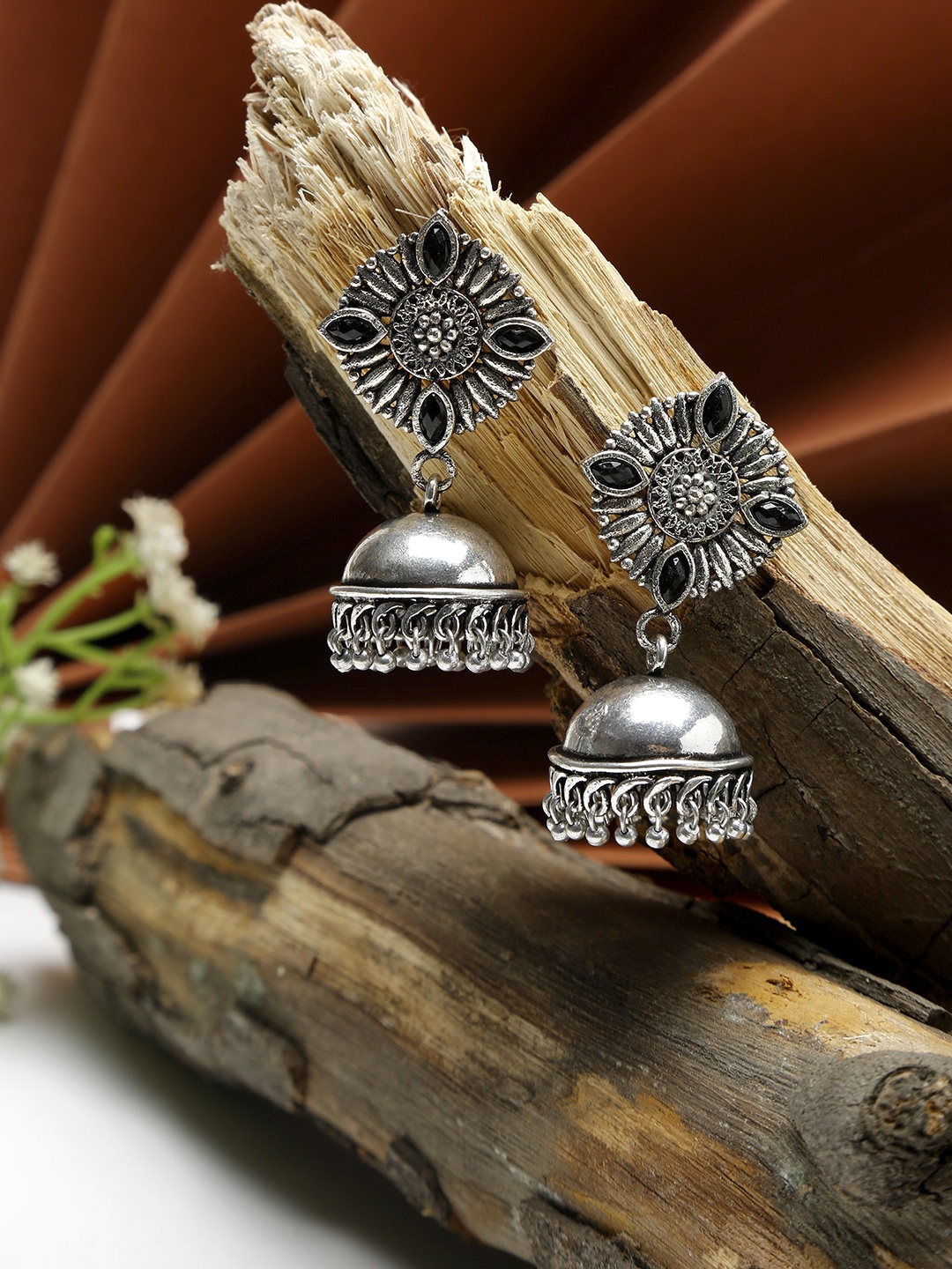 

NEUDIS Silver-Toned Dome Shaped Jhumkas Earrings