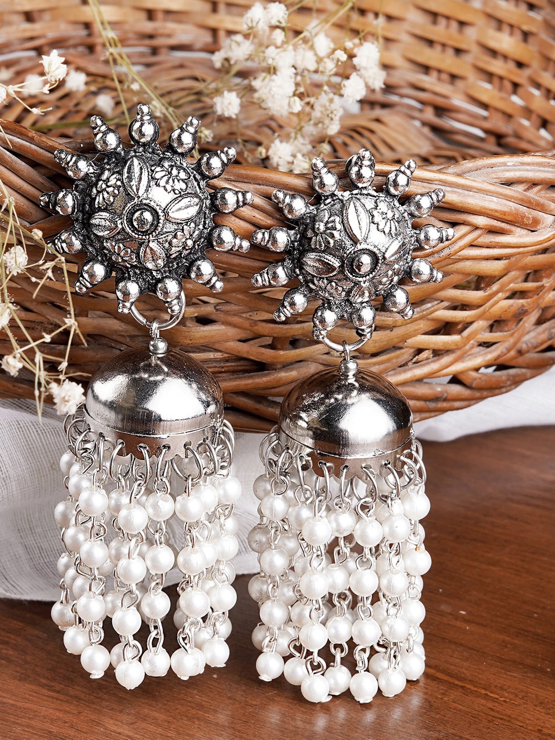 

TEEJH Silver-Toned & White Contemporary Jhumkas Earrings