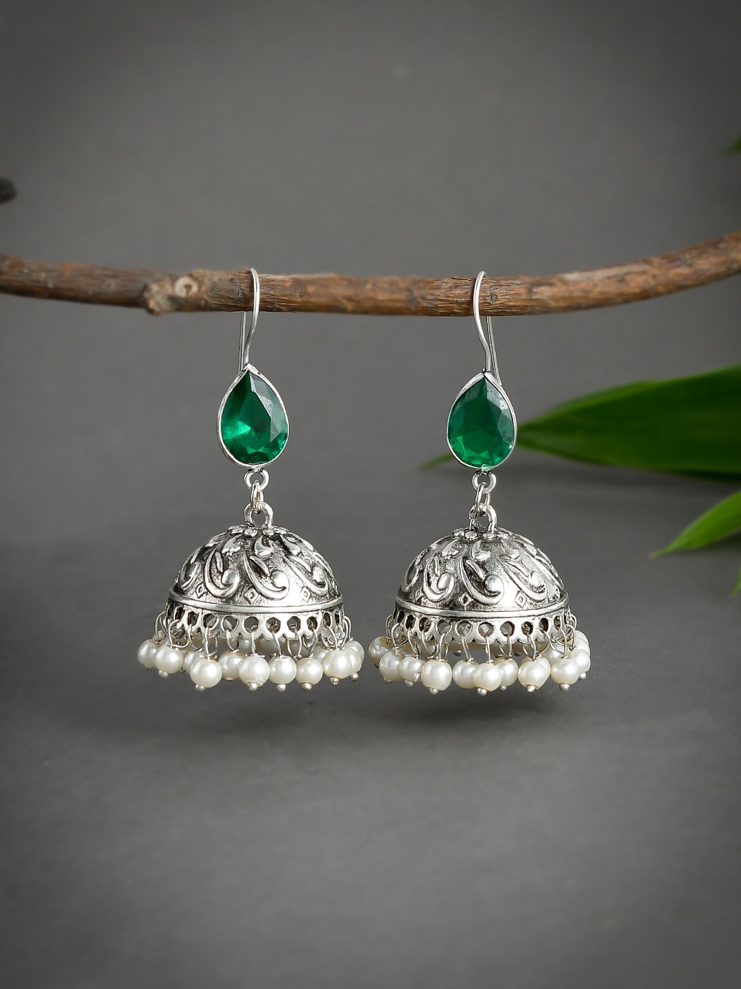 

Silvermerc Designs Women Silver-Toned & Green Dome Shaped Oxidised Jhumkas Earrings