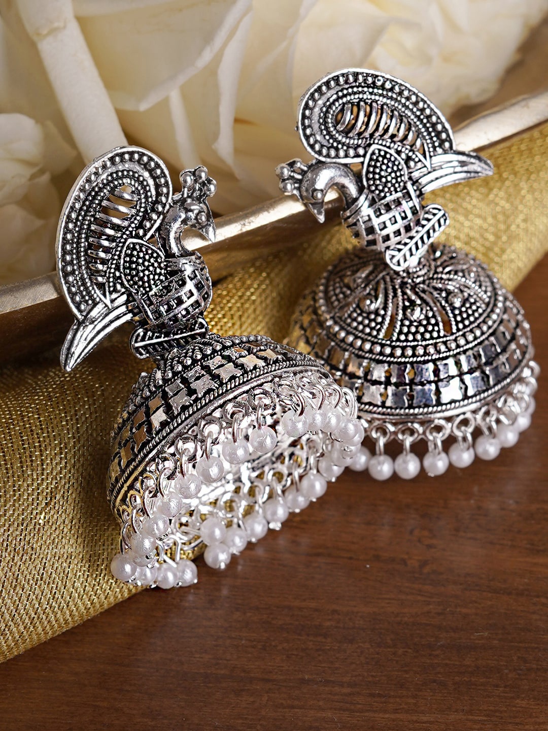 

TEEJH Silver-Toned Peacock Shaped Jhumkas Earrings