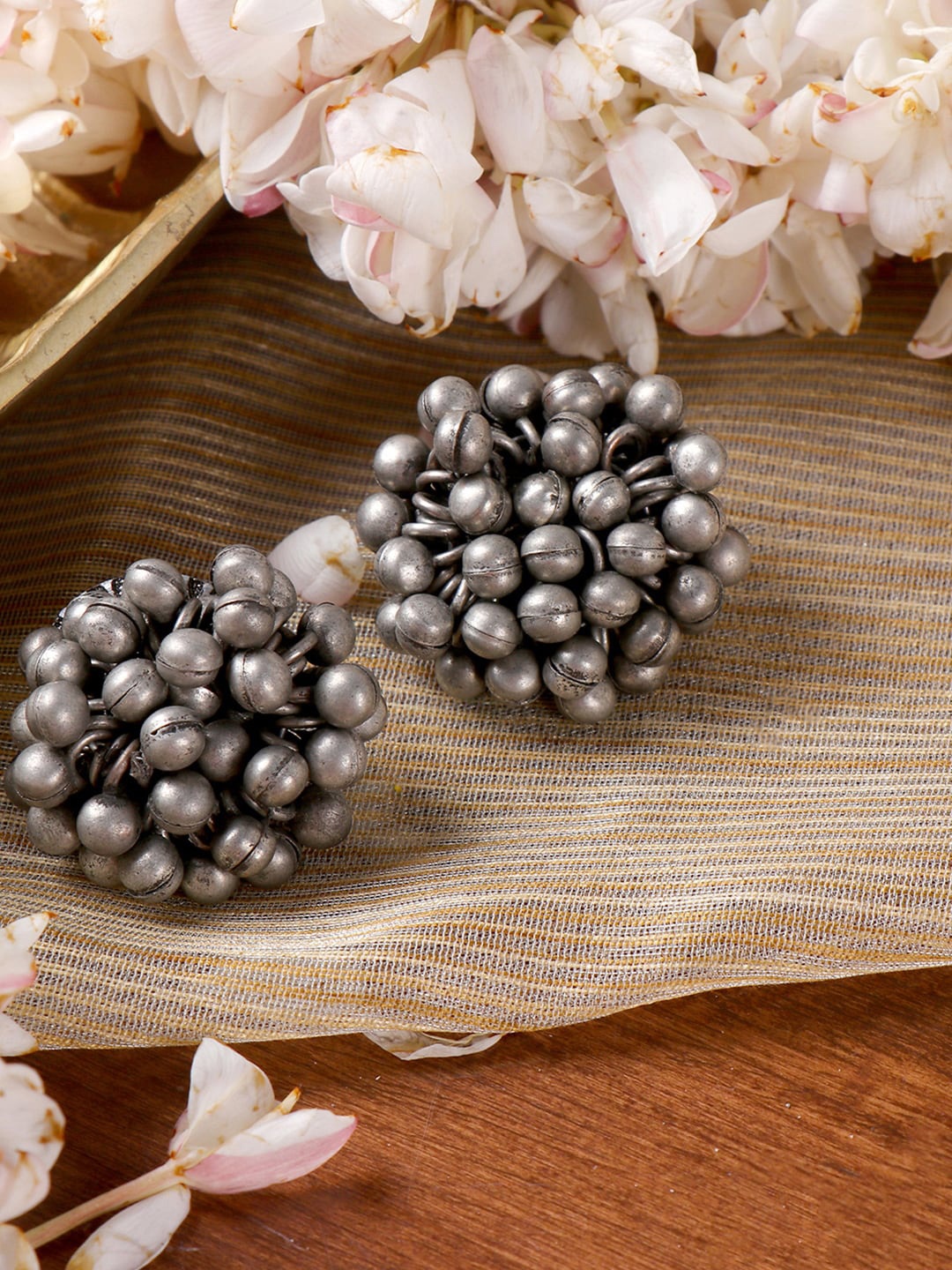 

TEEJH Silver-Plated Oxidised Contemporary Ghungroo Drop Earrings