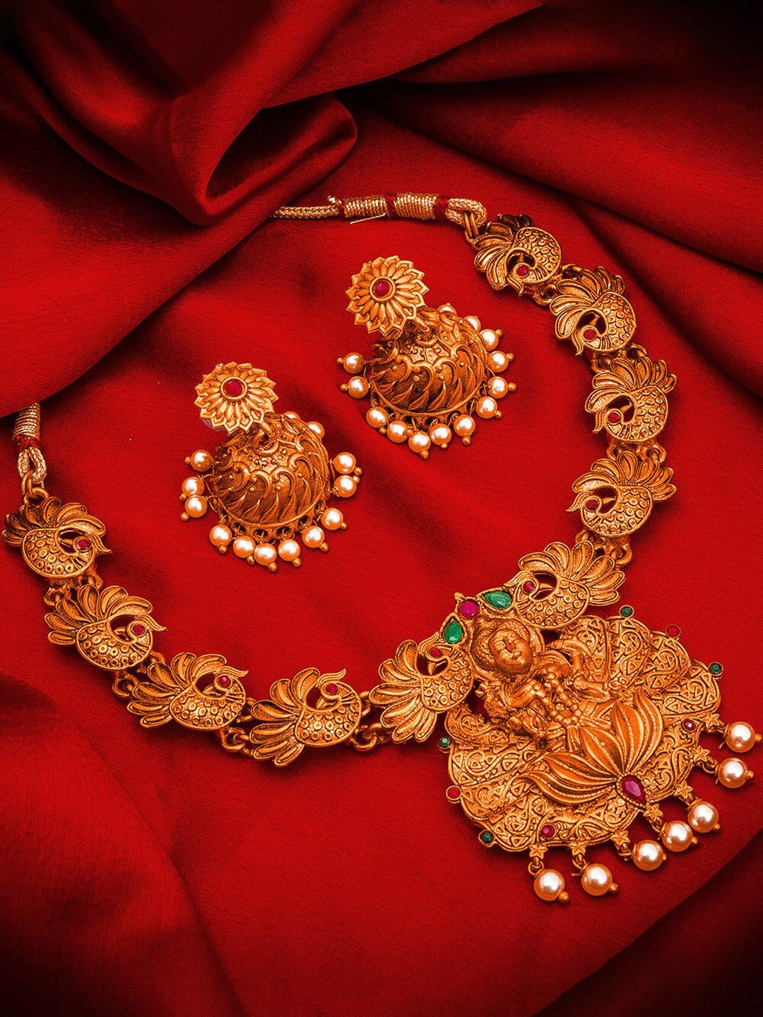 

aadita Gold-Plated Green Pearls -Studded Royal Temple Choker Jewellery Set