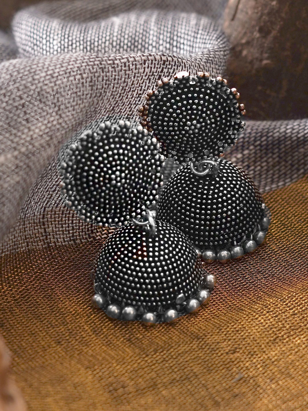 

TEEJH Silver-Plated Dome Shaped Jhumkas Earrings