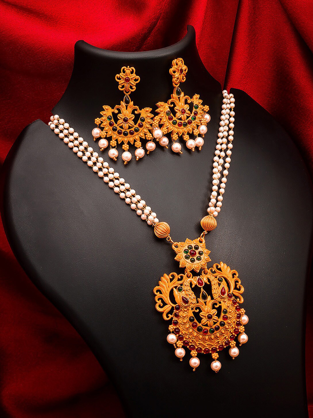 

aadita Gold-Plated White & Green Stone-Studded & Pearl Beaded Jewellery Set