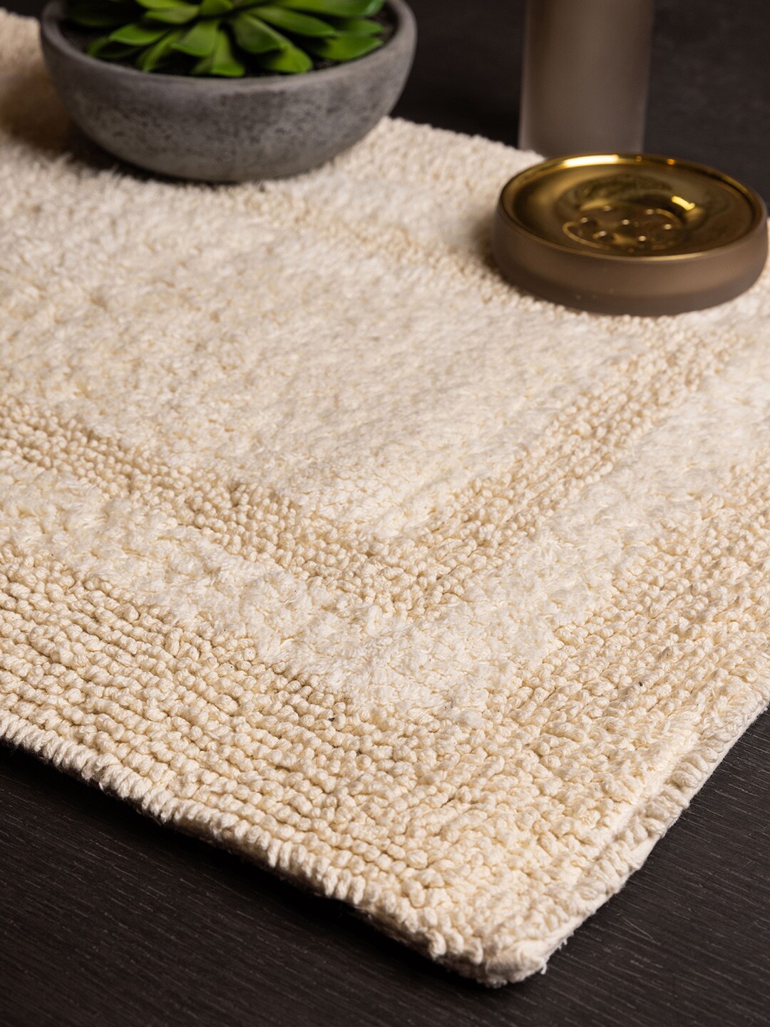 

Pure Home and Living Off White Double Border Reversible Cotton Bathmat