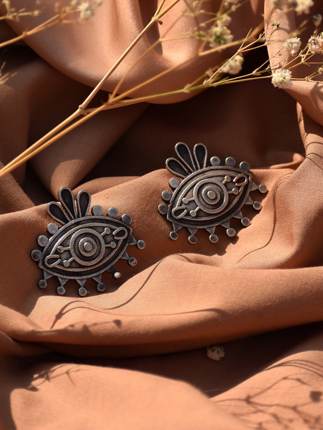 

TEEJH Silver-Plated Oxidised Contemporary Naina Studs