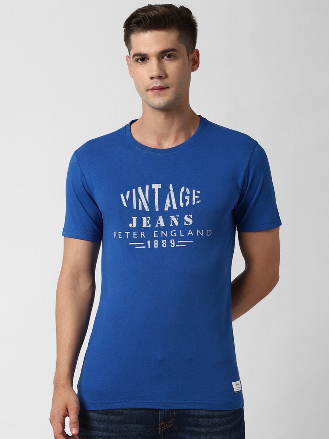 

Peter England Casuals Men Blue Typography Printed Applique T-shirt