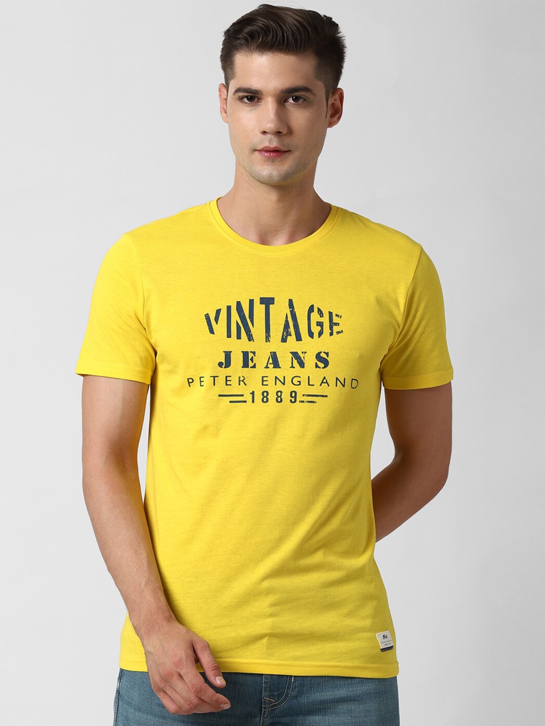 

Peter England Casuals Men Yellow & Blue Printed Slim Fit T-shirt