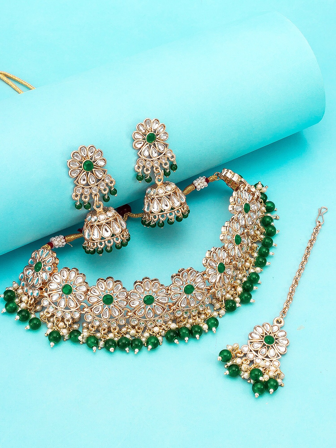

aadita Gold-Plated Green & White Stone-Studded & Beaded Temple Jewellery Set