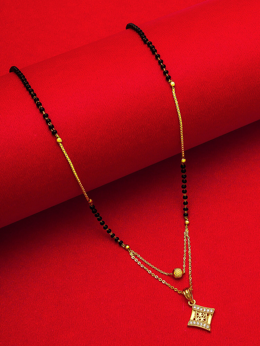 

aadita Gold-Plated & Black AD-Studded Beaded Mangalsutra