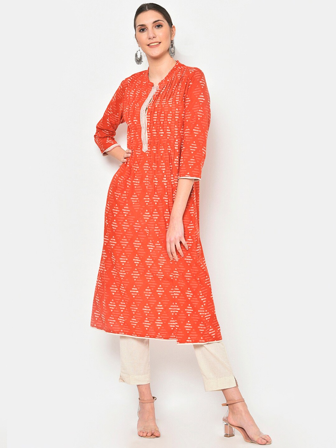 

DESI WOMANIYA Women Orange Panelled Pure Cotton Kurti with Trousers