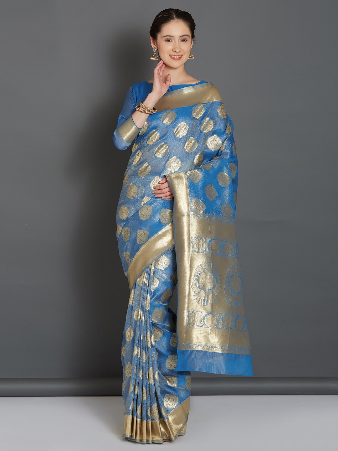 

Mitera Blue & Gold-Toned Ethnic Motifs Zari Silk Blend Banarasi Saree