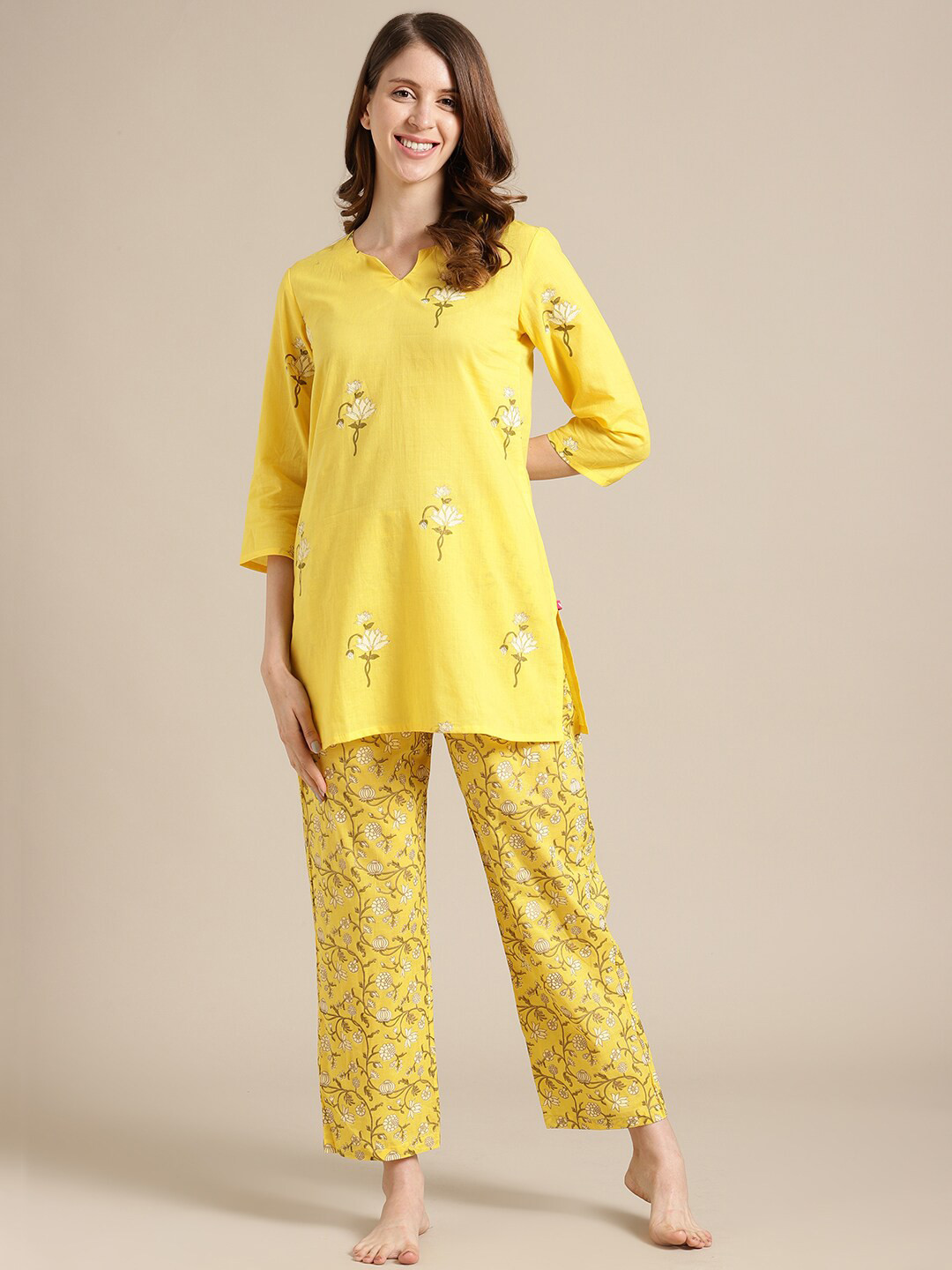 

Varanga Women Yellow Printed Kurti with Pyjamas