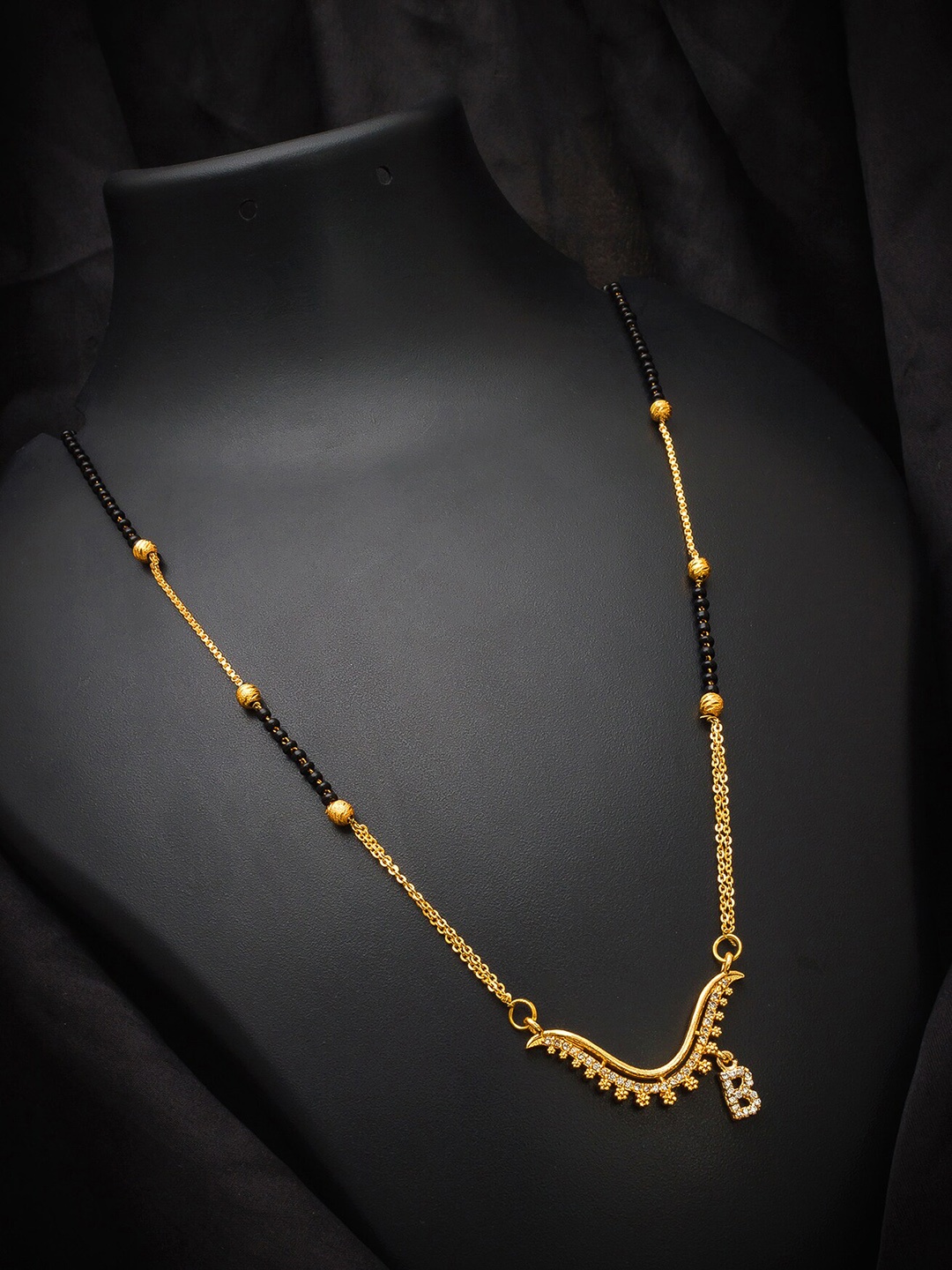 

aadita Gold-Plated Alphabet Initials Letter B Mangalsutra