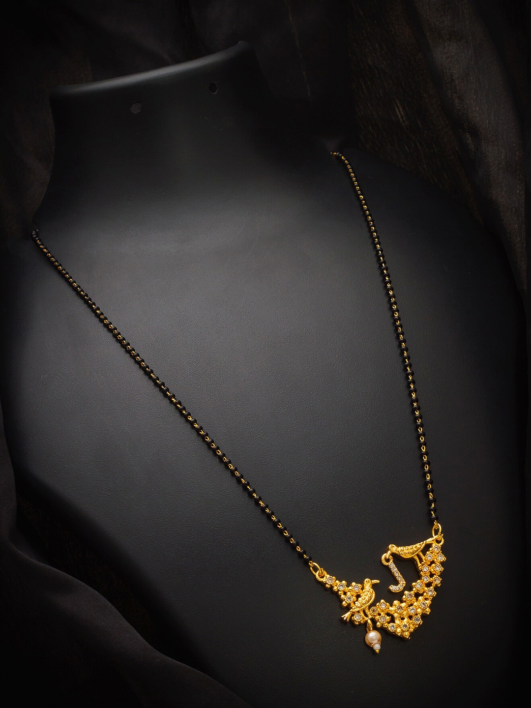 

aadita Gold-Plated Black & White AD-Studded & Beaded Mangalsutra