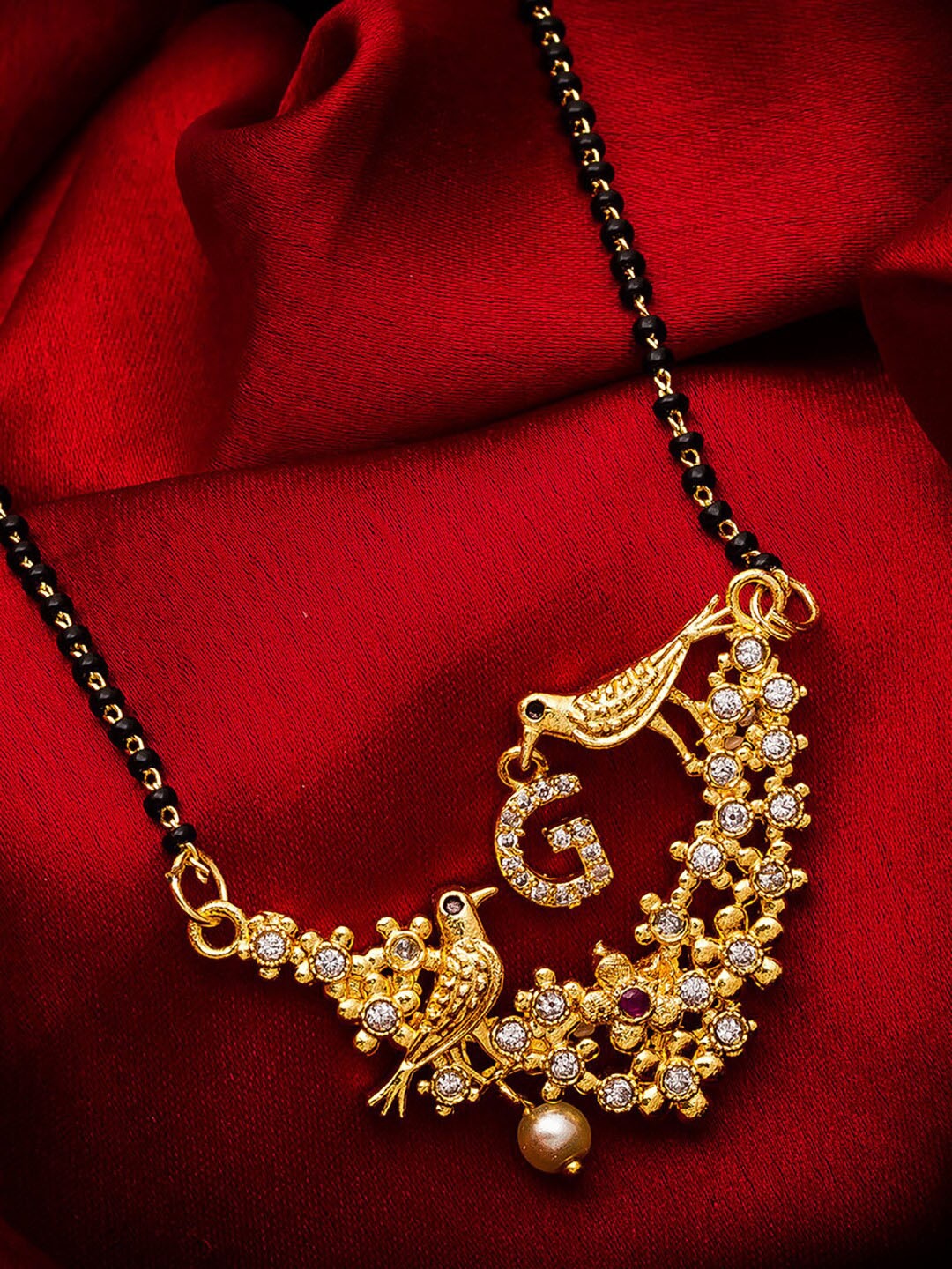 

aadita Gold-Plated Black & White AD-Studded & Beaded Mangalsutra