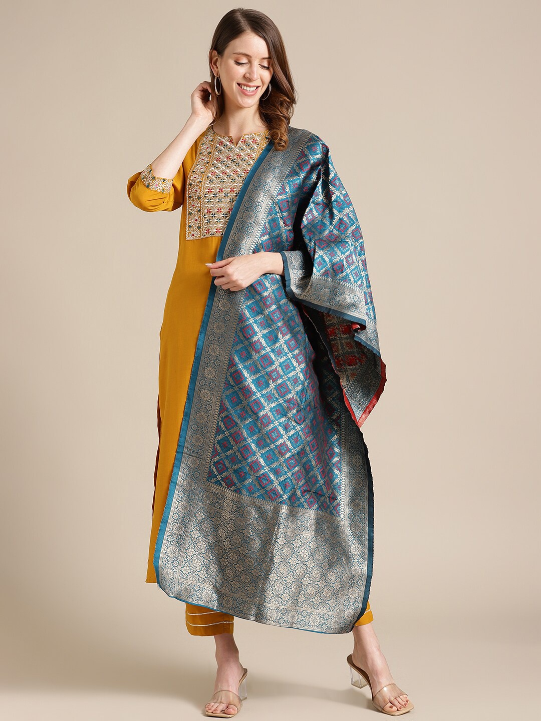 

Varanga Women Yellow Ethnic Motifs Embroidered Thread Work Kurta with Palazzos & With Dupatta