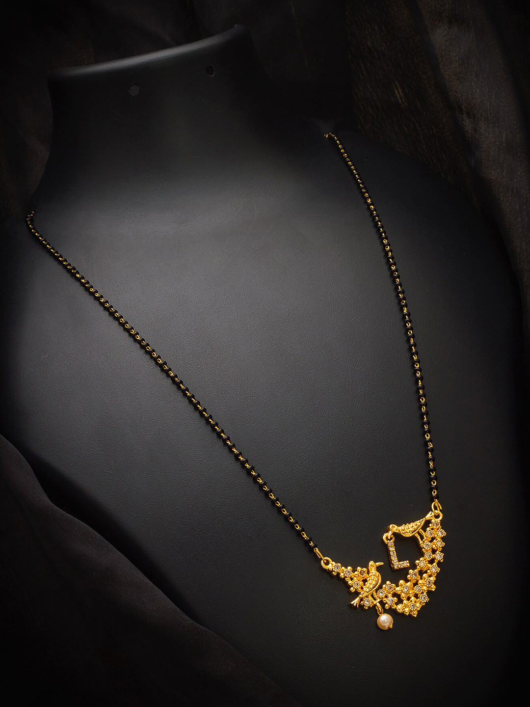 

aadita Gold-Plated Black Beaded & White AD-Studded Alphabet Letter L Mangalsutra