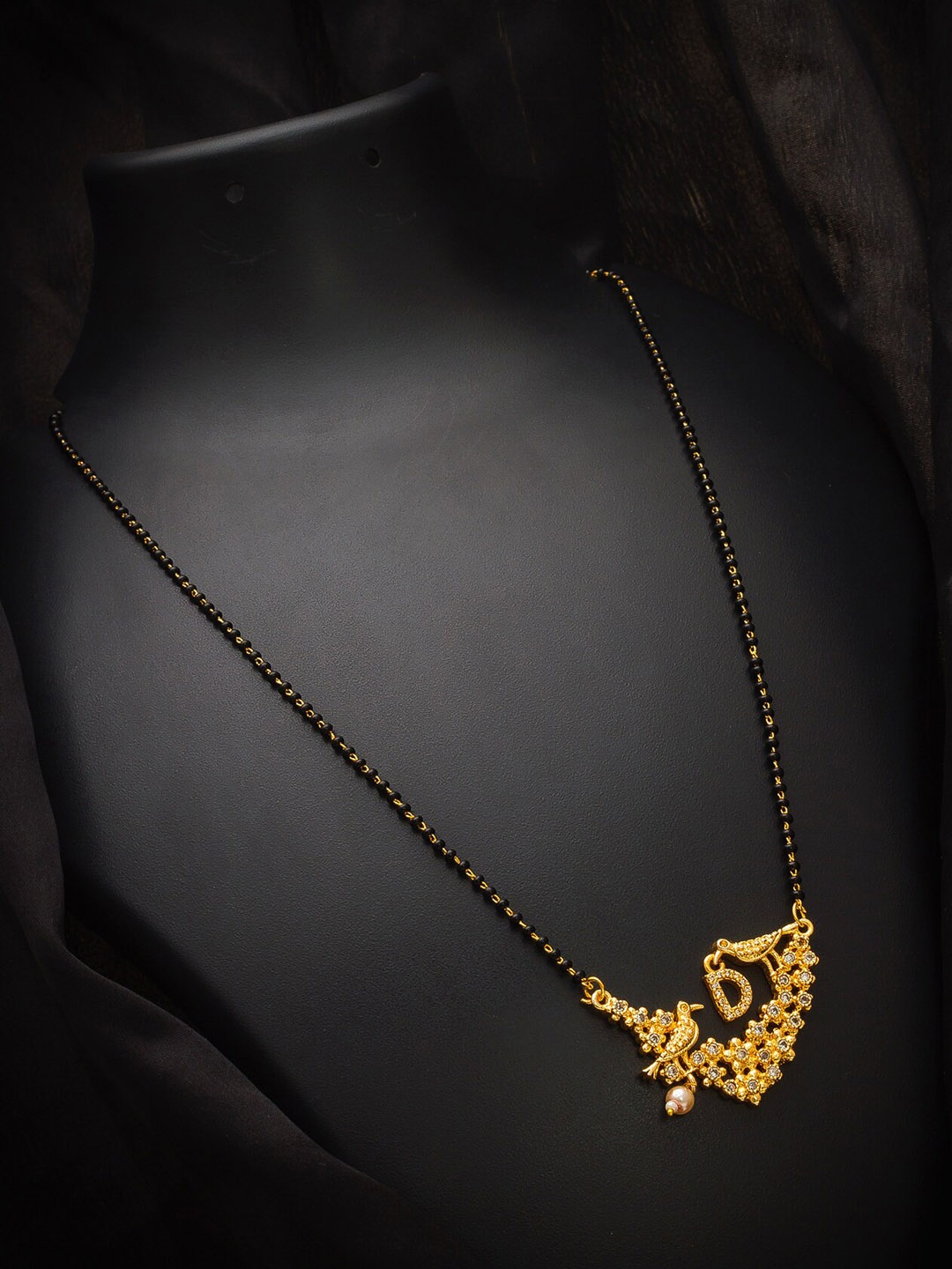 

aadita Gold-Plated Black Beaded & White AD-Studded Alphabet Initials Letter D Mangalsutra