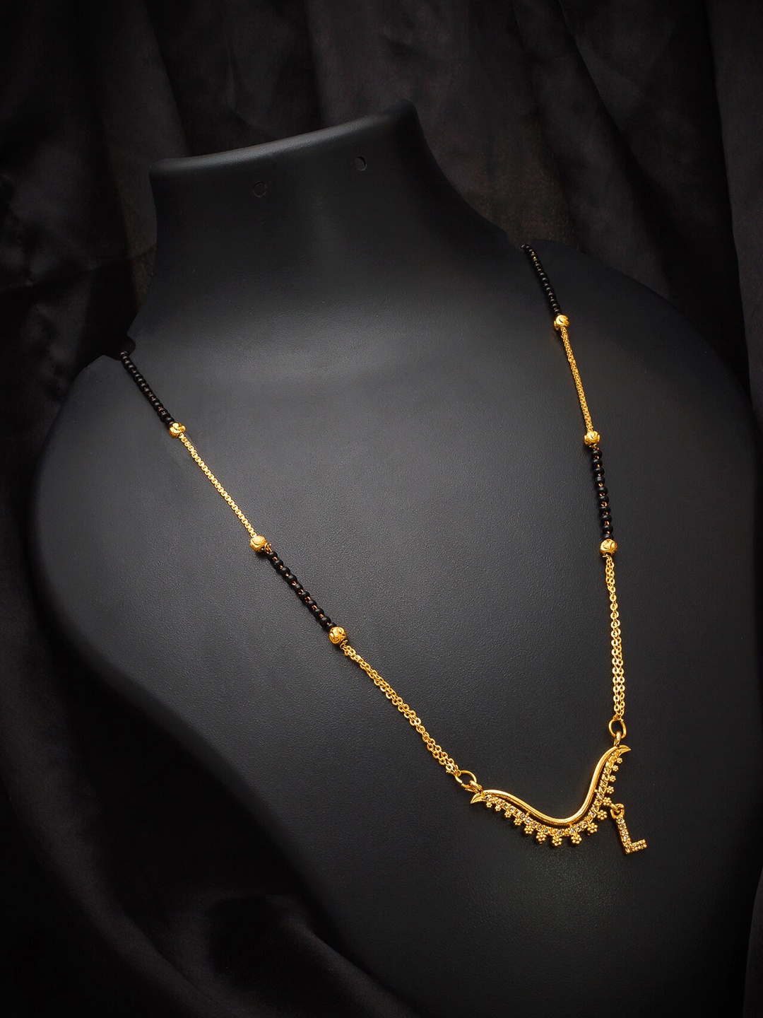 

aadita Gold-Plated Black & White AD-Studded & Beaded Alphabet Initials Letter L Mangalsutra