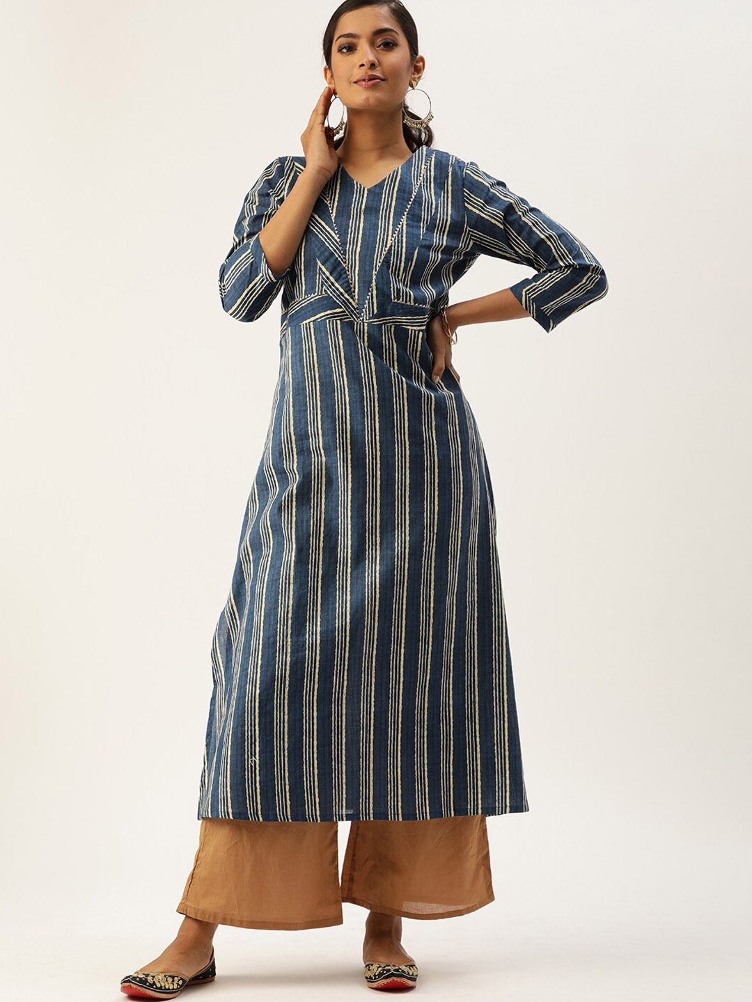 

Varanga Women Blue & Beige Striped Kurta