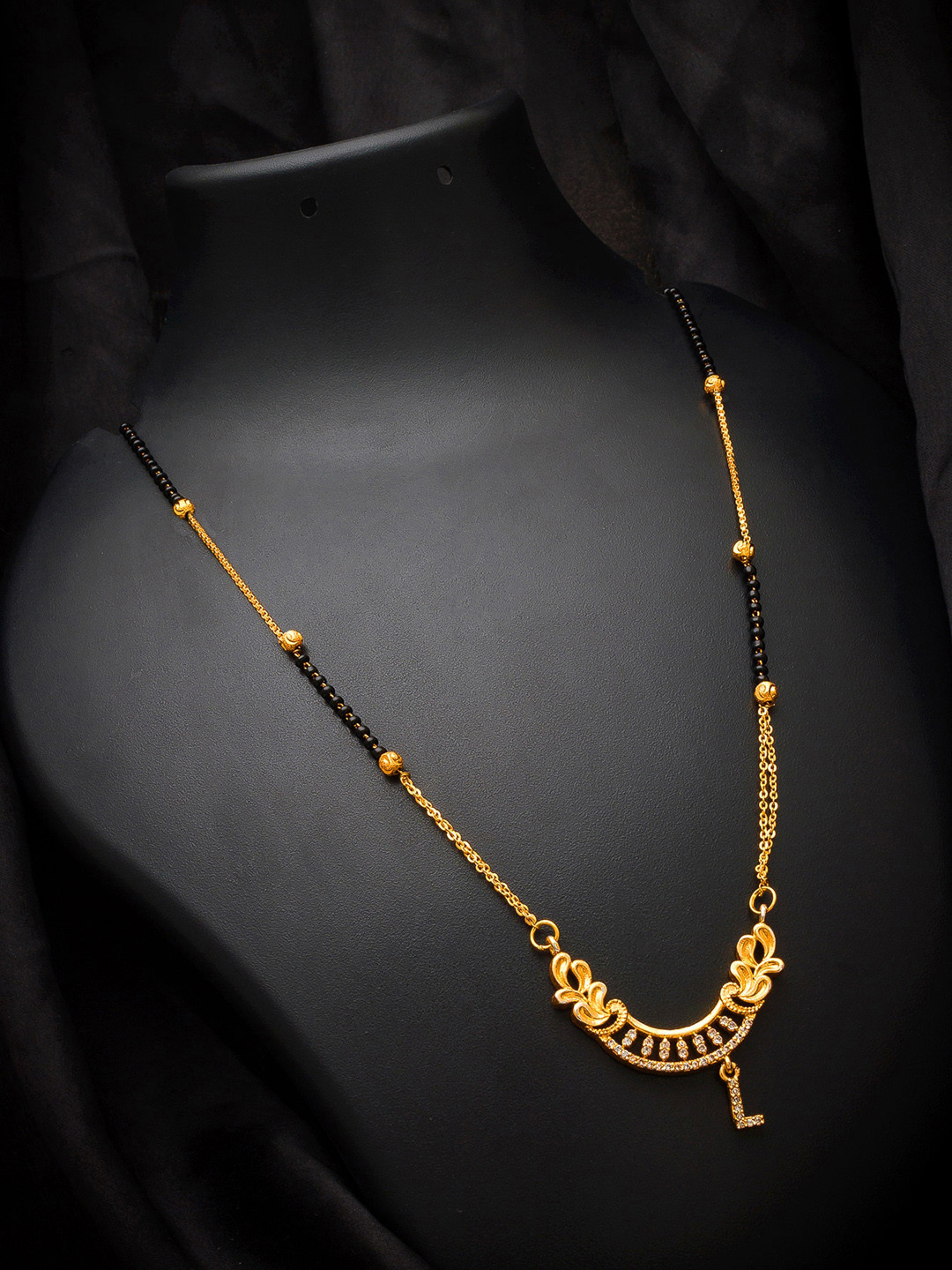 

aadita Gold-Plated Black Beaded & White AD-Studded Alphabet Initials Letter L Mangalsutra