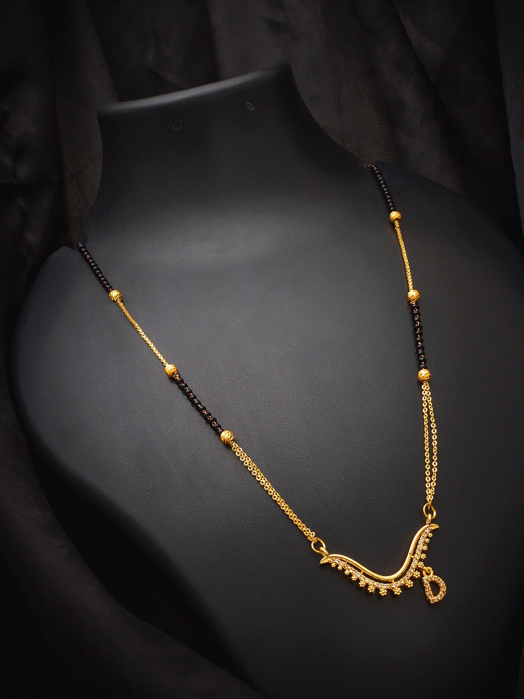 

aadita Gold-Plated Alphabet Initials Letter D Mangalsutra