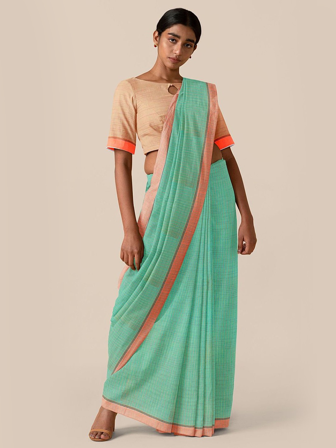 

Taneira Sea Green Checked Pure Cotton Saree