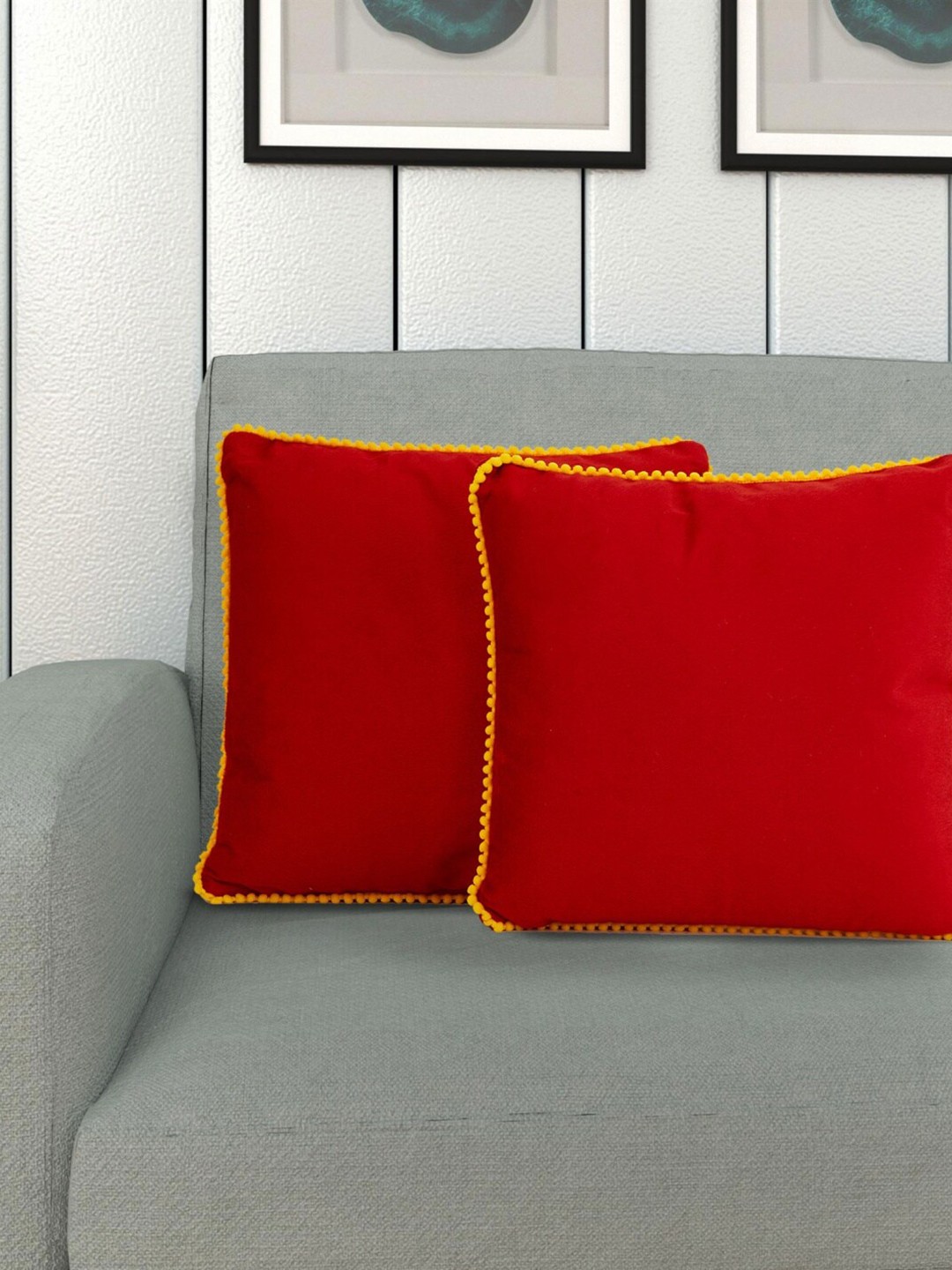 

Home Centre Set Of 2 Red Pom-Pom Bordered Filled Cushions