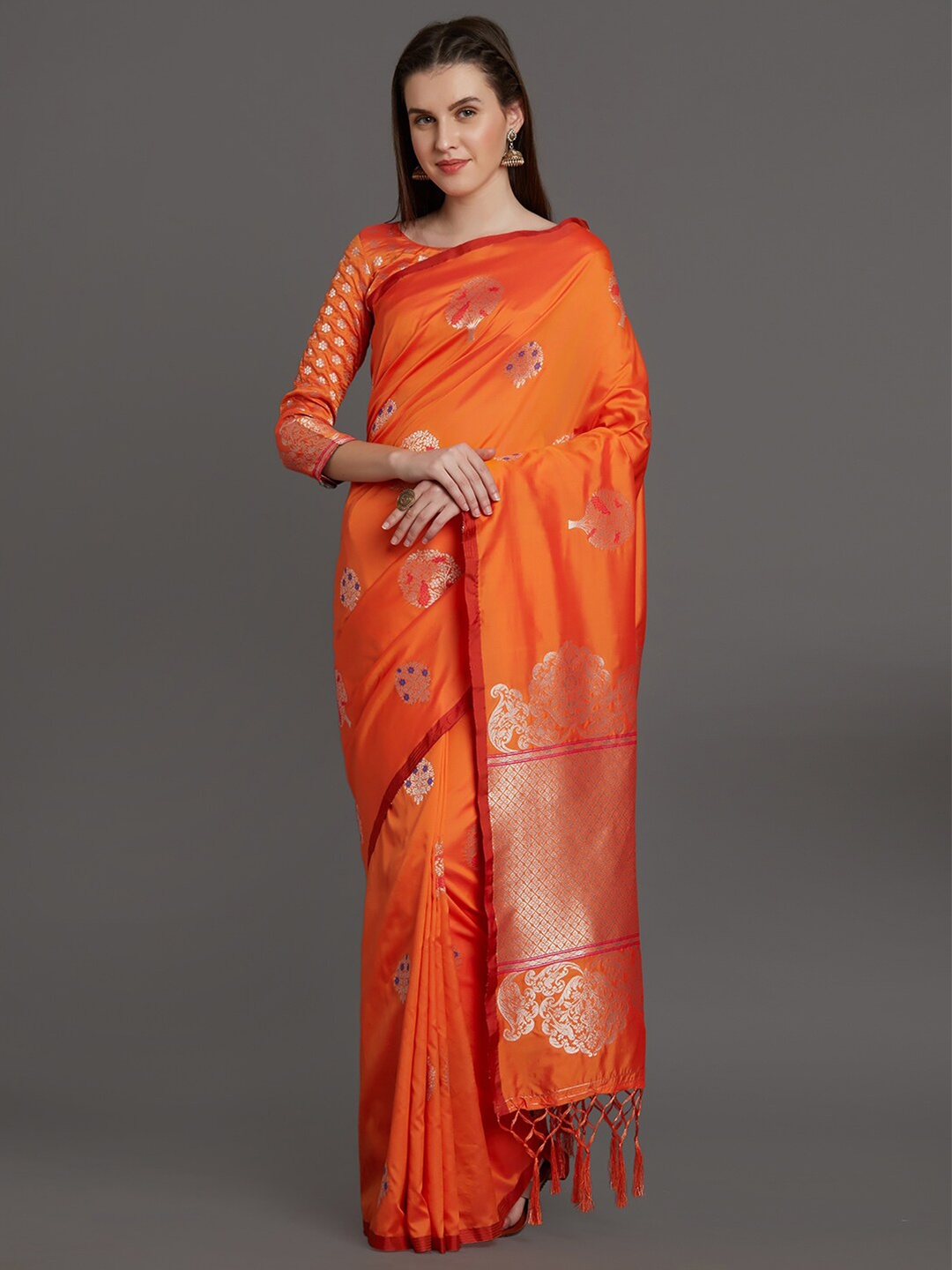 

Mitera Orange Ethnic Motifs Zari Silk Blend Saree