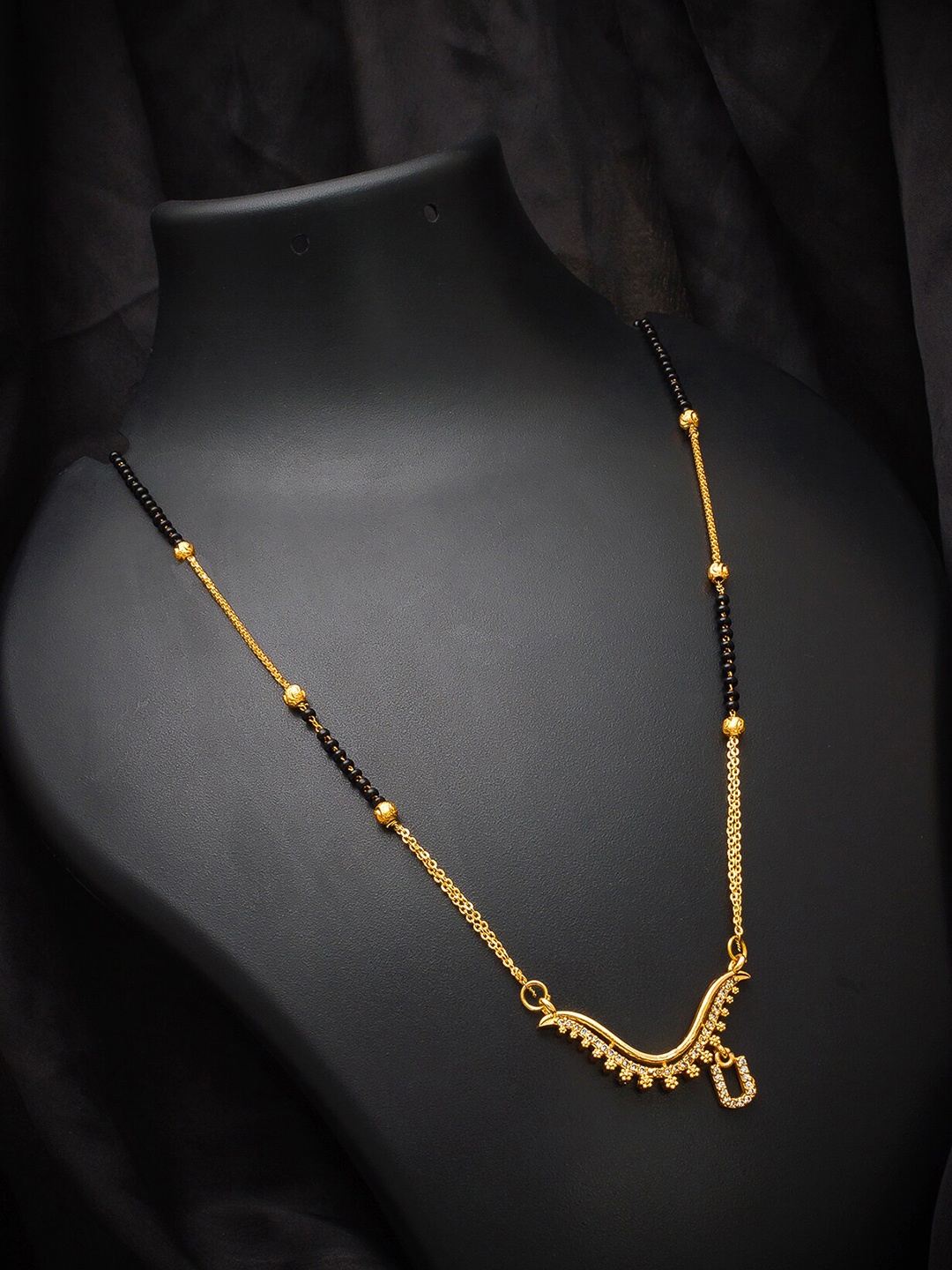 

aadita Gold-Plated Black & White AD-Studded & Beaded Mangalsutra