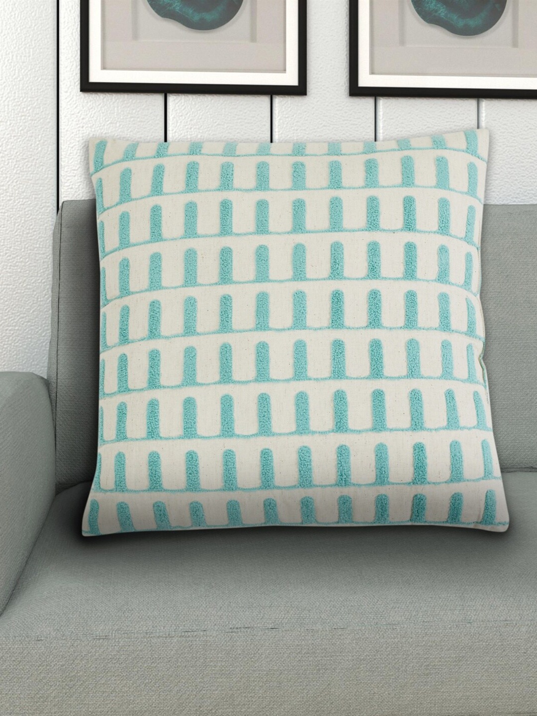 

Home Centre Off White & Turquoise Blue Embroidered Cotton Filled Cushion