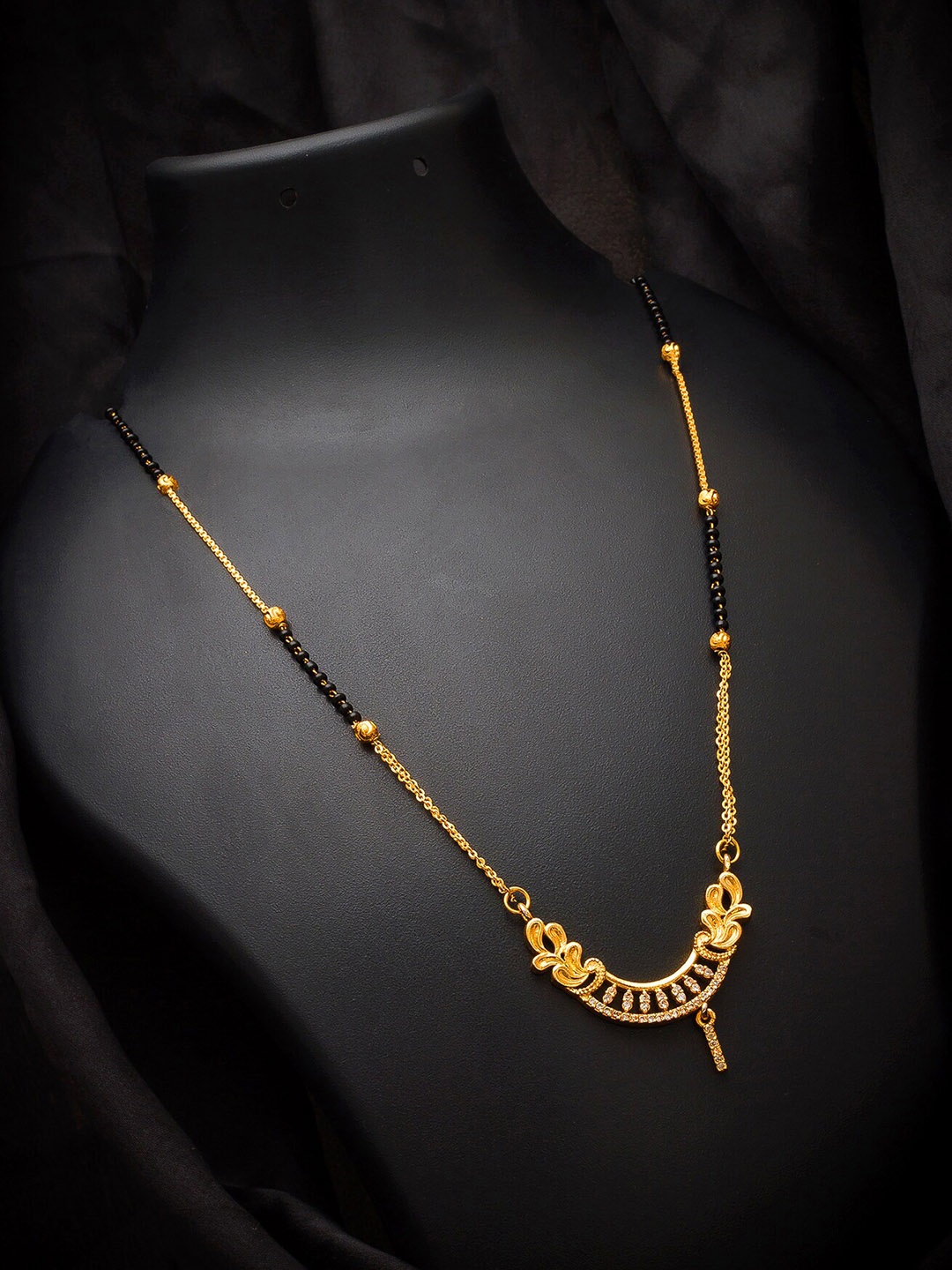 

aadita Gold-Plated Black & White AD-Studded & Beaded Mangalsutra