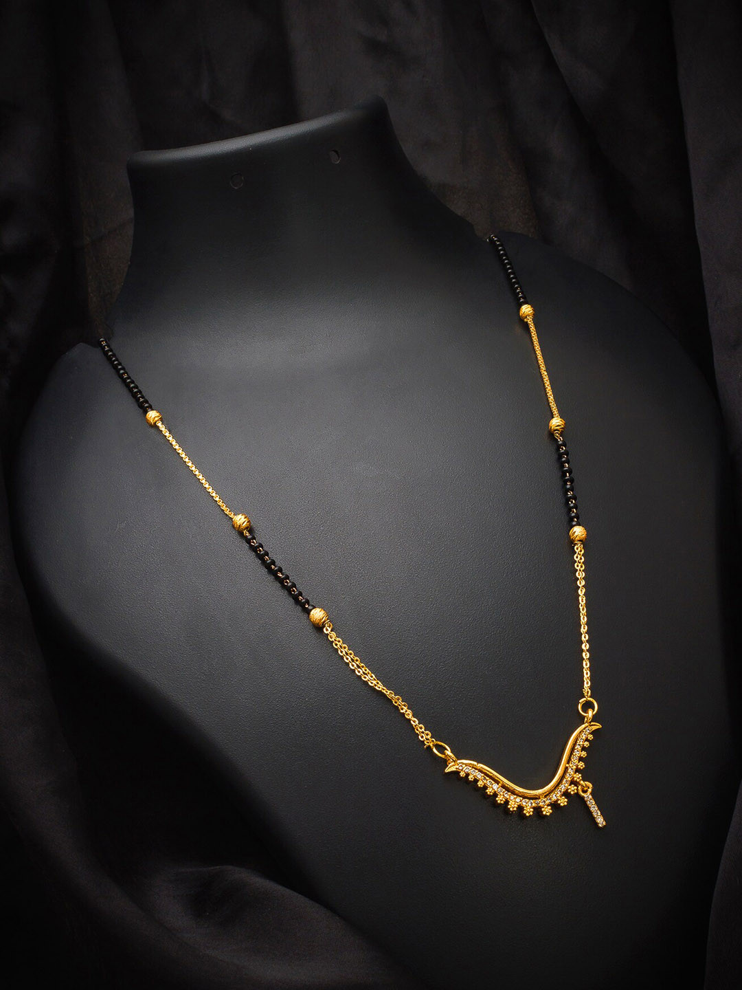 

aadita Gold-Plated Black & White Stone-Studded Alphabet Initials Letter I Mangalsutra