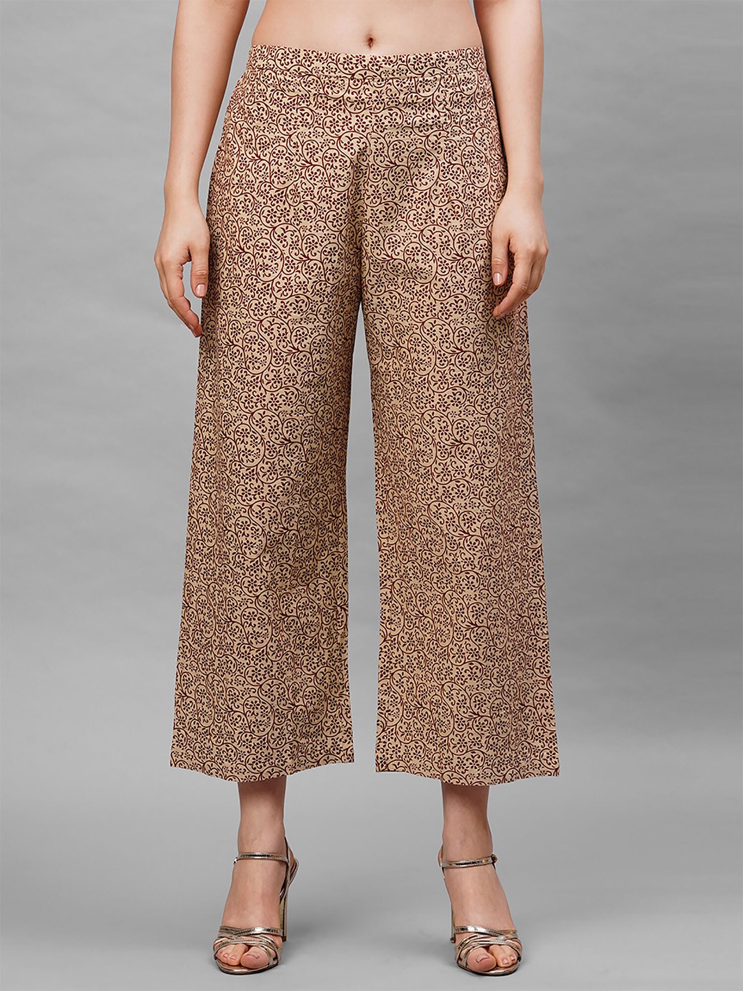 

Indo Era Women Beige & Maroon Ethnic Motifs Printed Ethnic Cotton Palazzos
