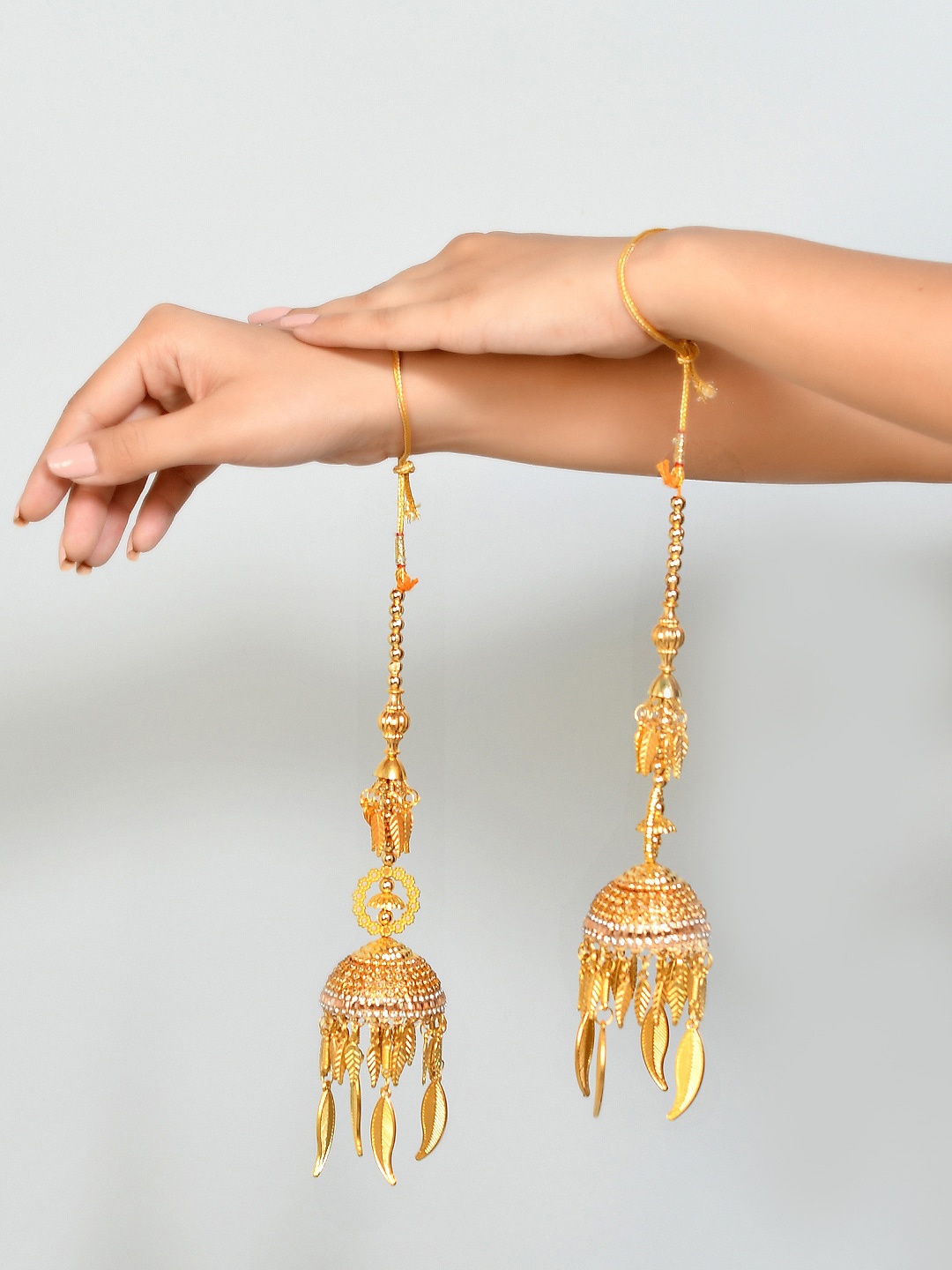 

Silvermerc Designs Set Of 2 Gold-Plated White Stone-Studded Kaleeras