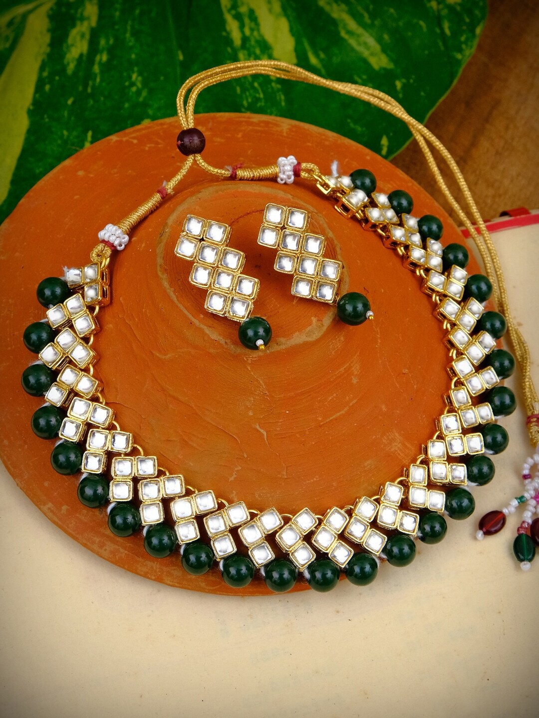 

Crunchy Fashion Gold-Plated Green & White Kundan-Studded & Beaded Handcrafted Jewellery Set