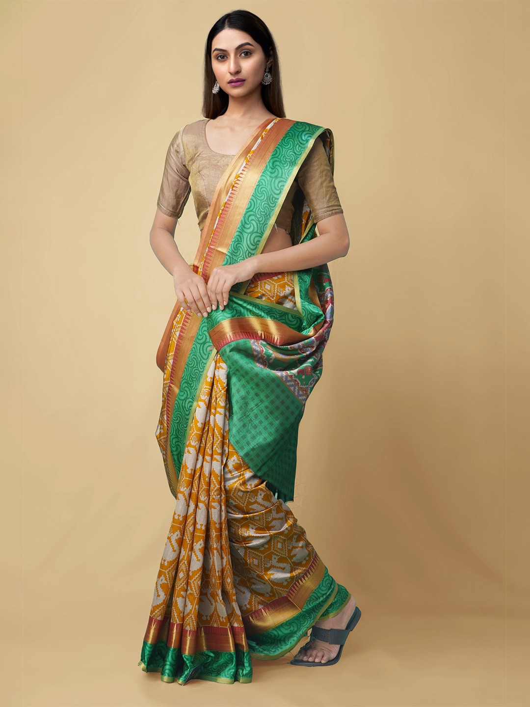 

Unnati Silks Mustard & Green Ethnic Motifs Art Silk Patola Saree