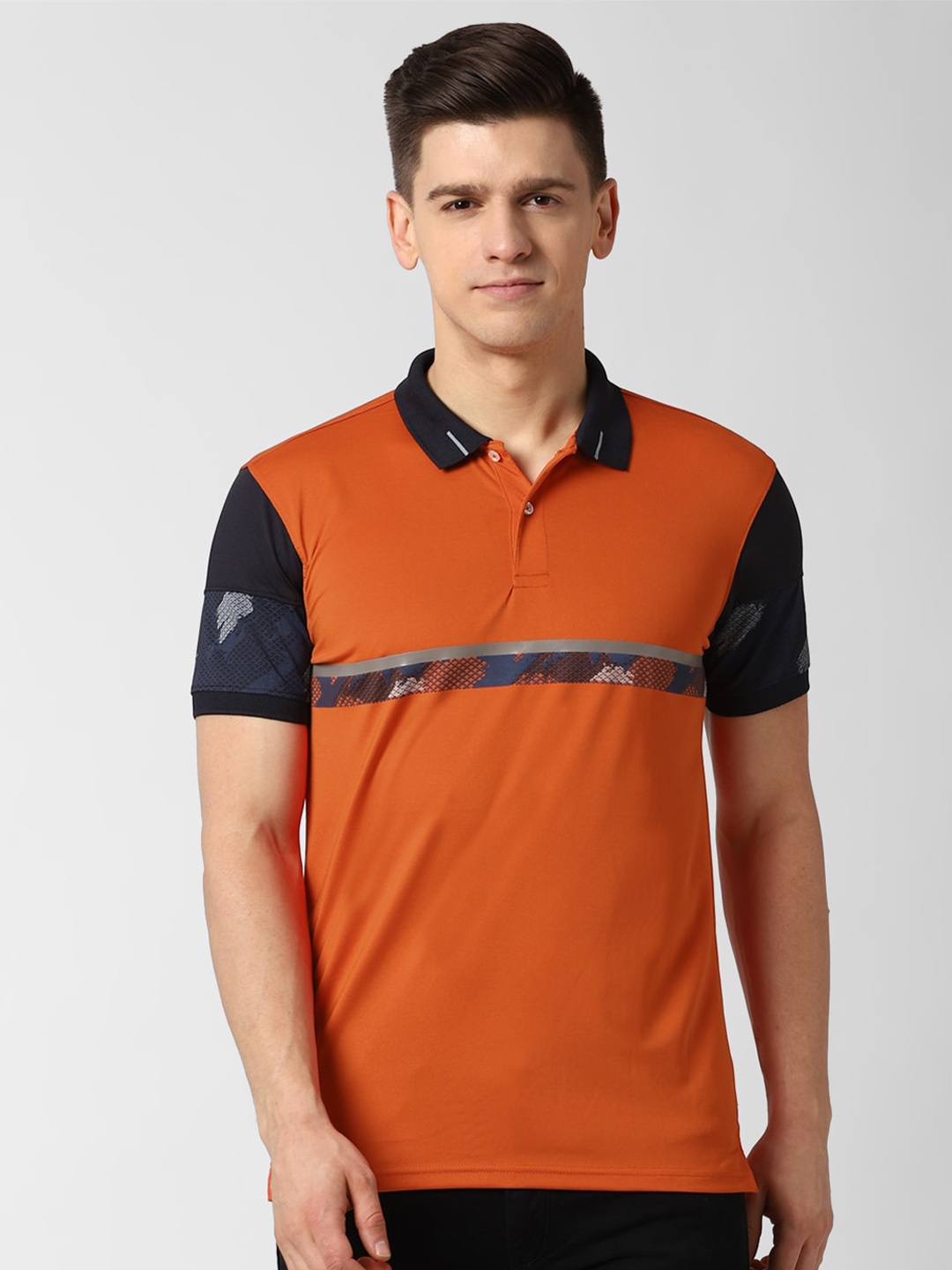 

Peter England Casuals Men Orange & Navy Blue Colourblocked Polo Collar T-shirt