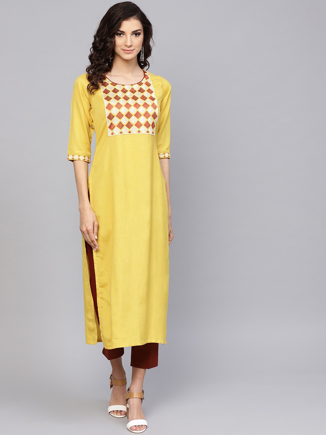 

Libas Women Yellow Ethnic Motifs Yoke Design Kurta