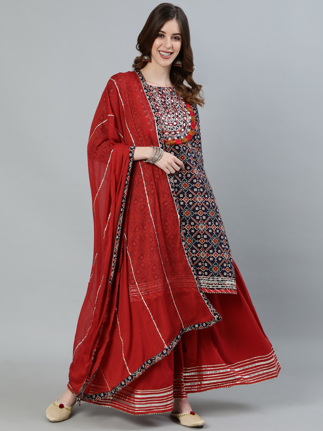 

Ishin Women Navy Blue Floral Embroidered Layered Pure Cotton Kurti with Sharara & With Dupatta