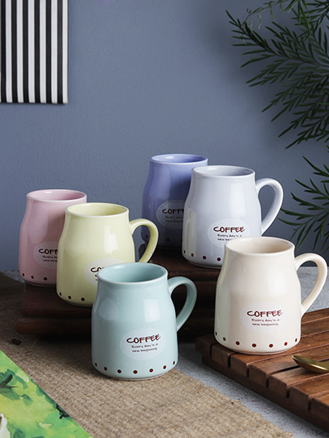

The Decor Mart Purple & Pink Printed 6 Ceramic Glossy Mugs Set