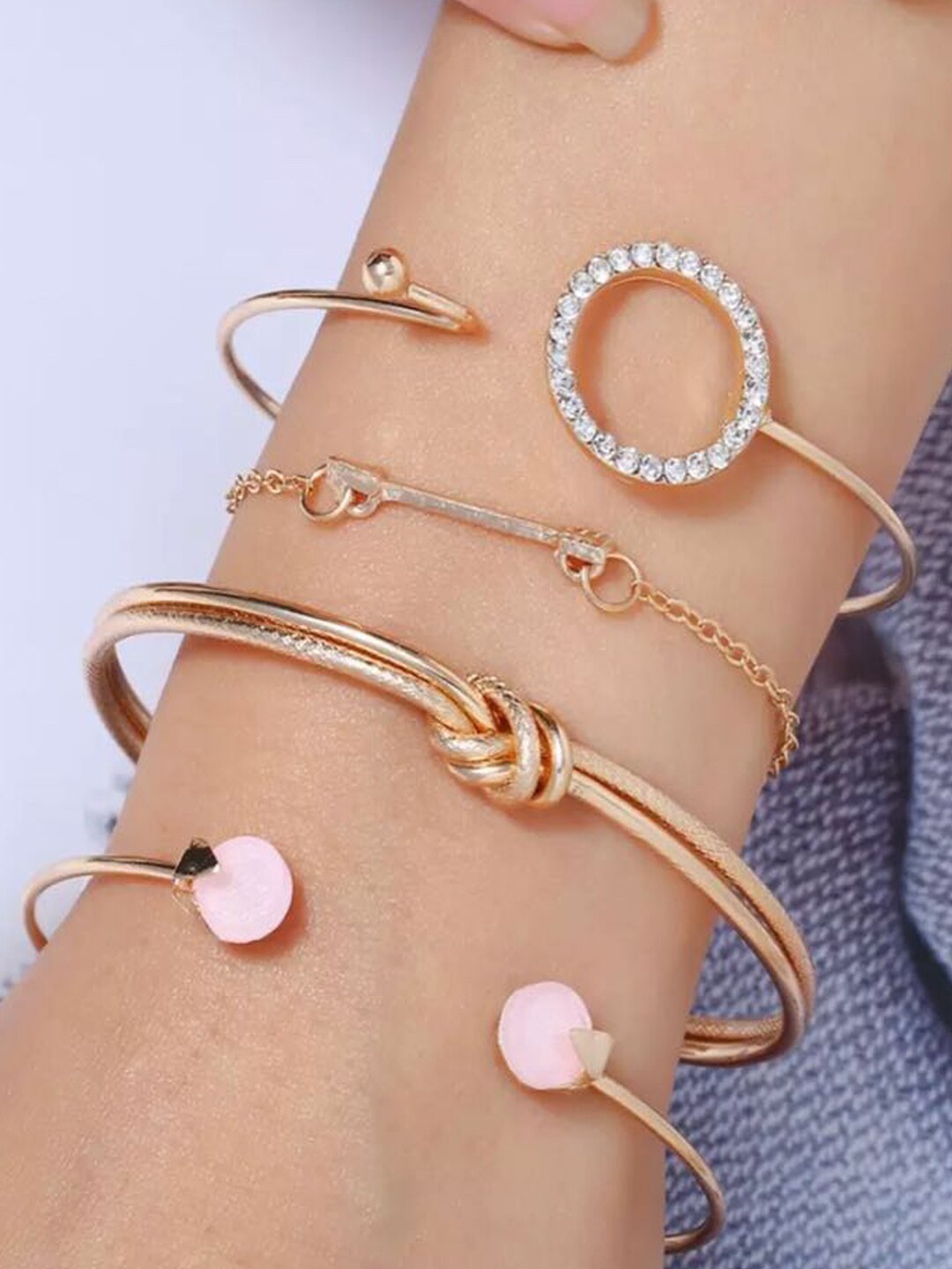 

Shining Diva Fashion Women Set of 4 Gold-Toned White Cubic Zirconia Gold-Plated Charm Bracelet