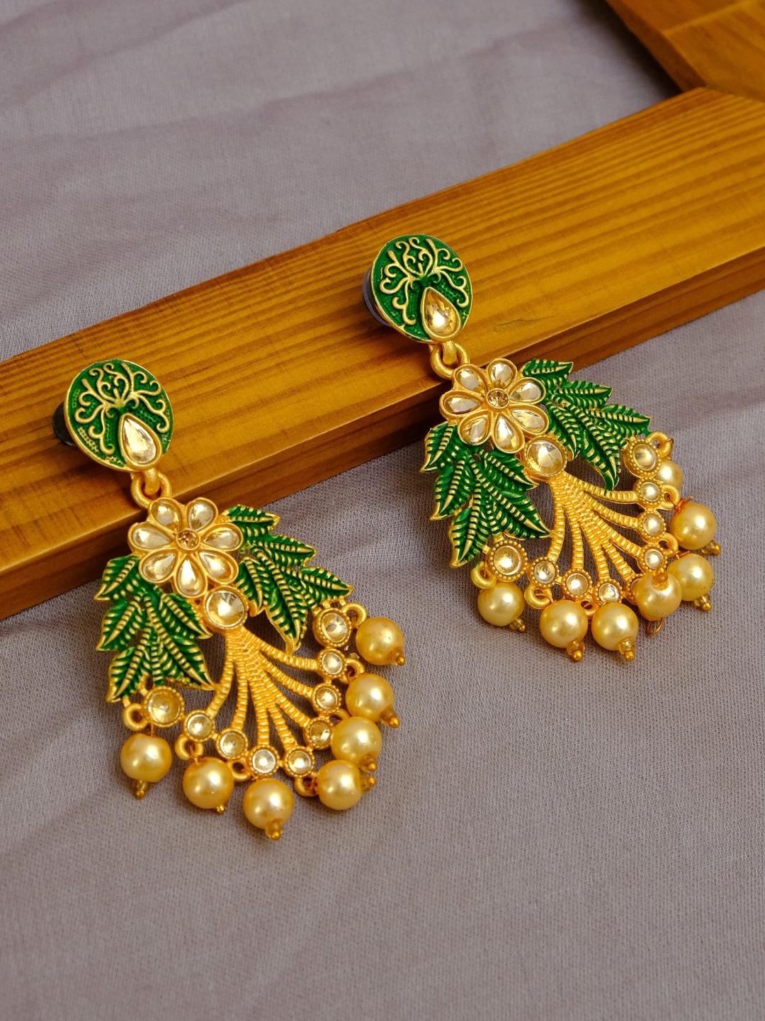 

Crunchy Fashion Gold-Toned & Green Leaf Shaped Drop Earrings