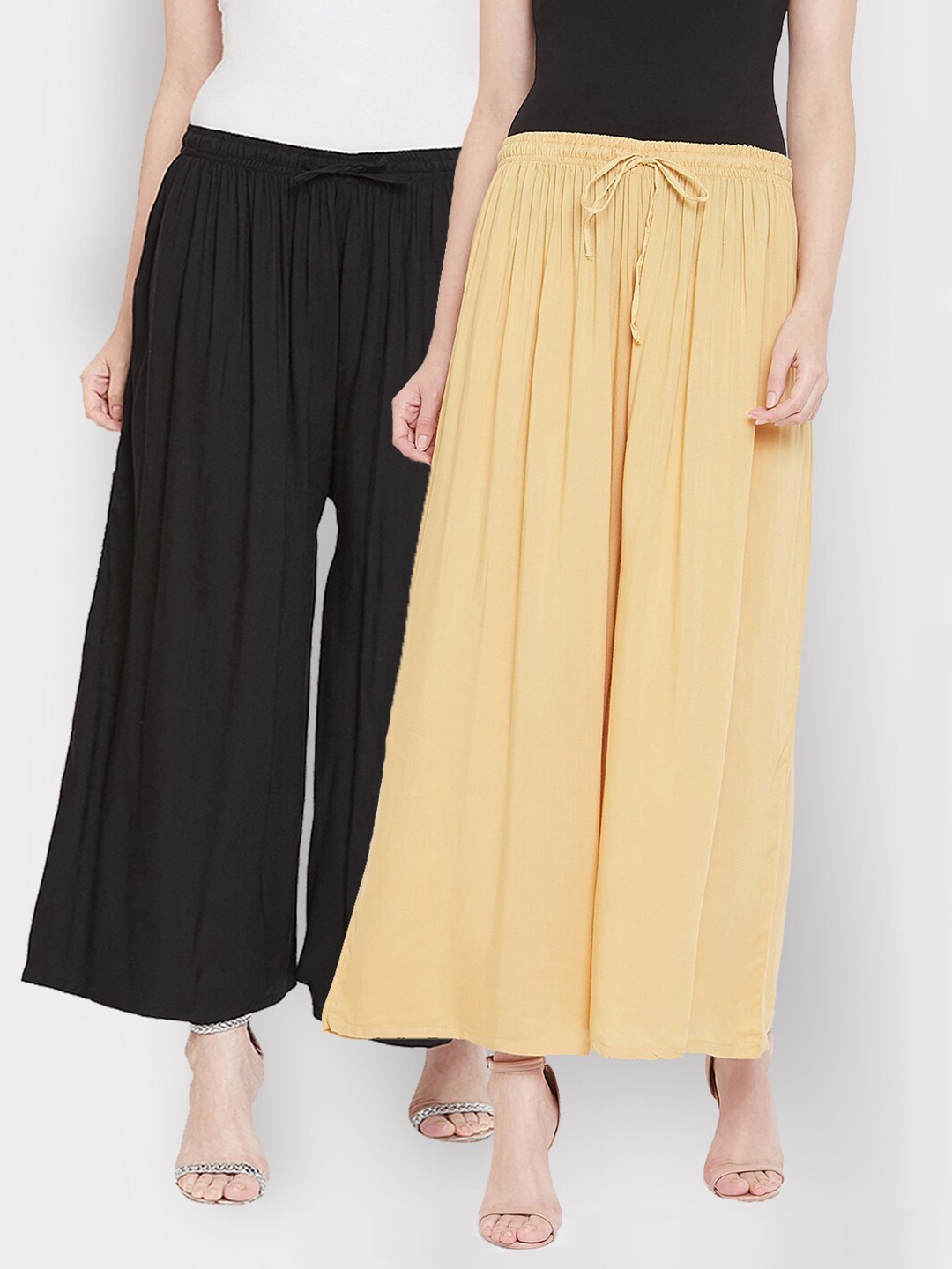 

Castle Women Pack of 2 Beige & Black Solid Flared Palazzos