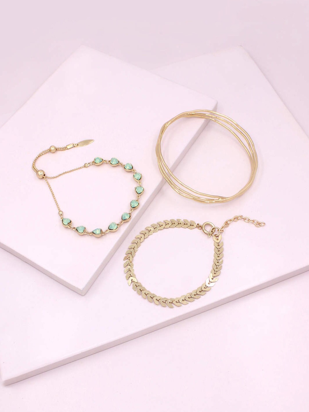 

Runway Ritual Set of 3 Women Gold-Toned & Green Crystals Gold-Plated Bangle-Style Bracelet