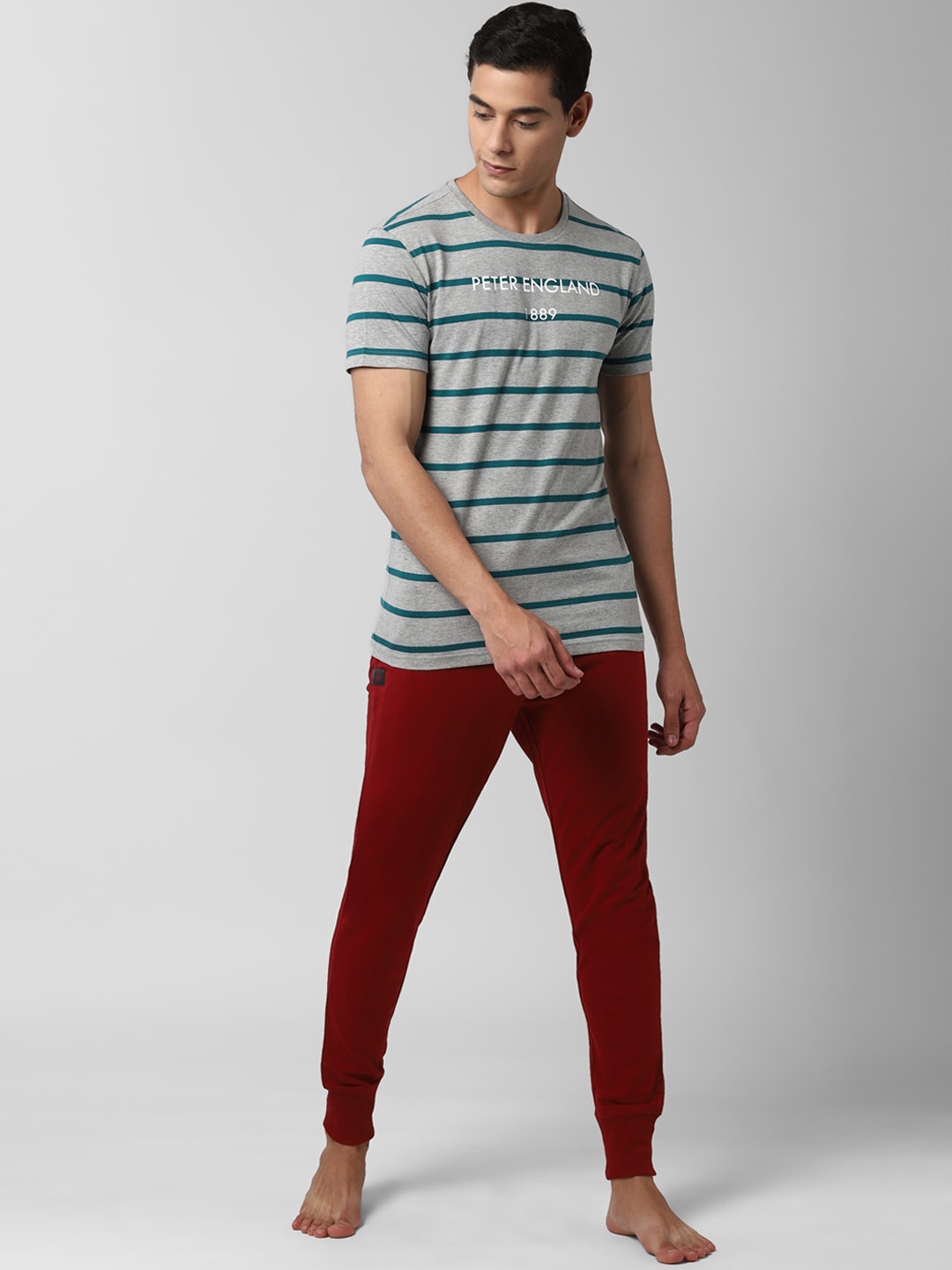 

Peter England Men Grey & Red Striped Tracksuit