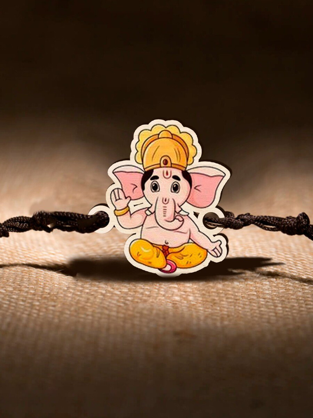 

Bigsmall Boys Yellow & Peach Ganesha Wooden Rakhi Design